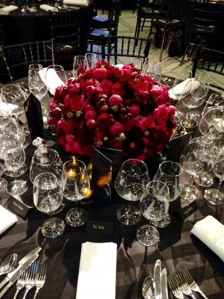 A dome of deep red roses as a table centrepiece